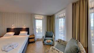 Отель Family Hotel Laxo Обзор Номер-студио с видом на море-4